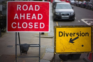 Road ahead closed - diversion signs