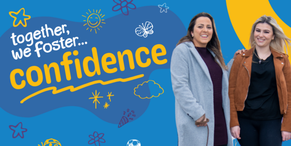 Image of woman and teen girl smiling walking dog