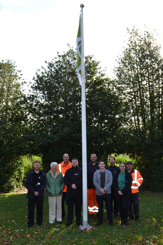 Photo of the Green Flag being raised at Elmfield Park