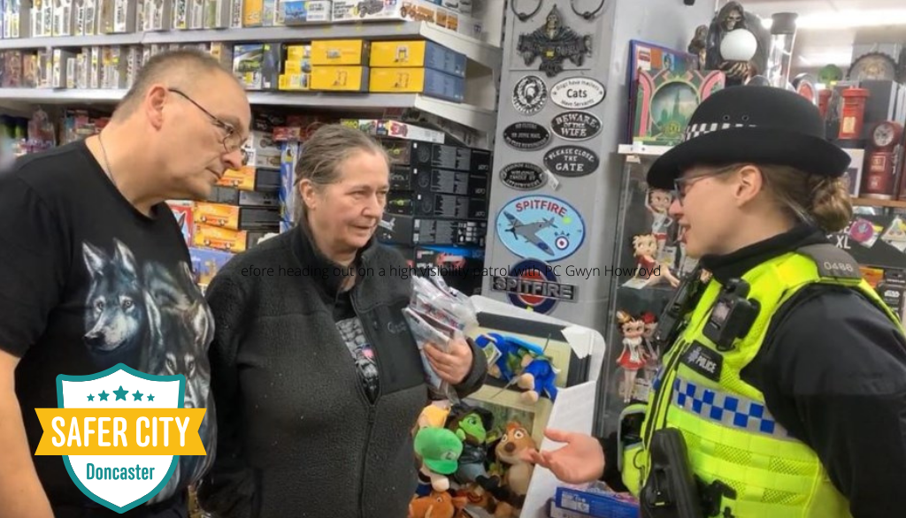 Image shows officer in retail crime team engaging with local business