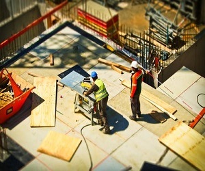 two people working on a construction site