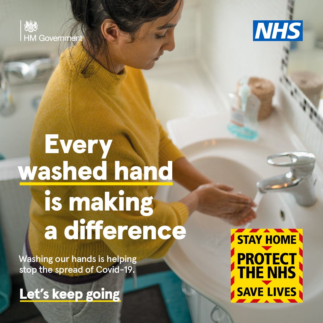 woman washing her hands 