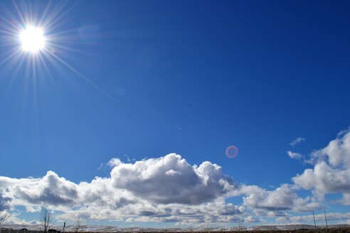 Sunny sky with some clouds