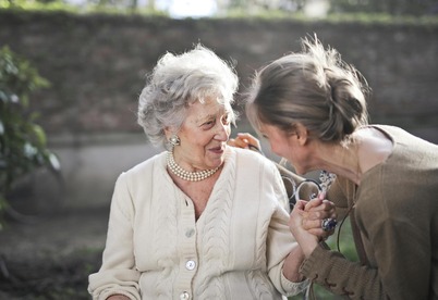 older lady and carer