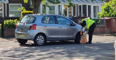 Car being clamped