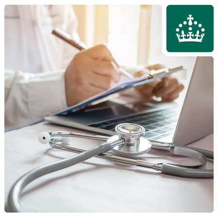 Doctor taking notes. 