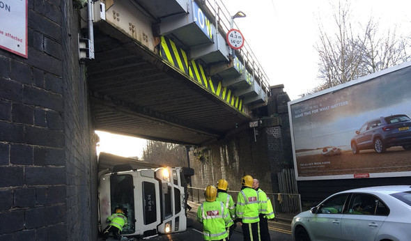 picture of lorry after colliding with bridge