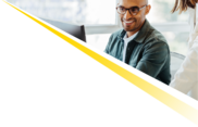 man looking at computer smiling