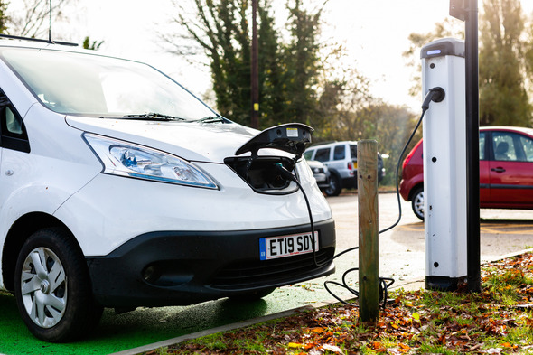 Electric van being charged
