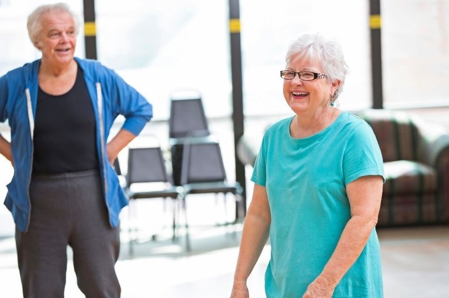 null elderly friends at a fitness class