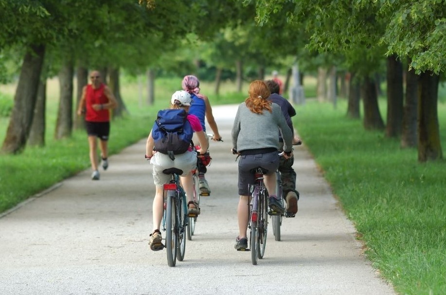null group of people cycling outside