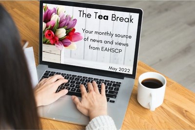 May newsletter header image inside laptop screen