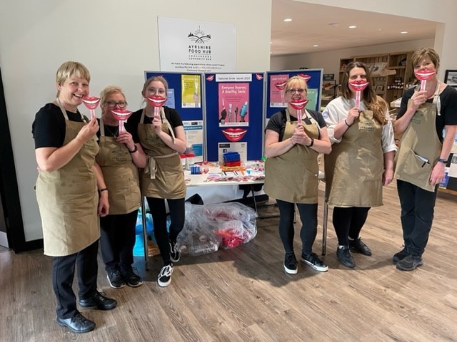Staff at Ayrshire Food Hub taking part in National Smile Month