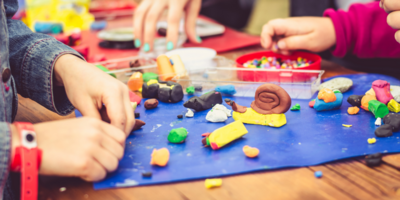 Children playing with plasticine