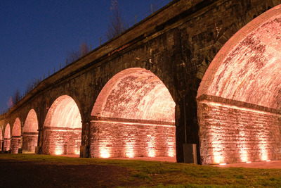 Viaduct lit orange