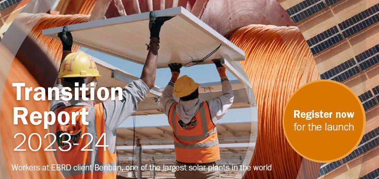 Transition Report 2023-24 promotional image showing two workers installing solar panels