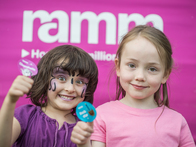 Two children with RAMM stickers