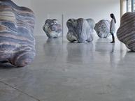 Massive Randall-Page sculptues in a gallery