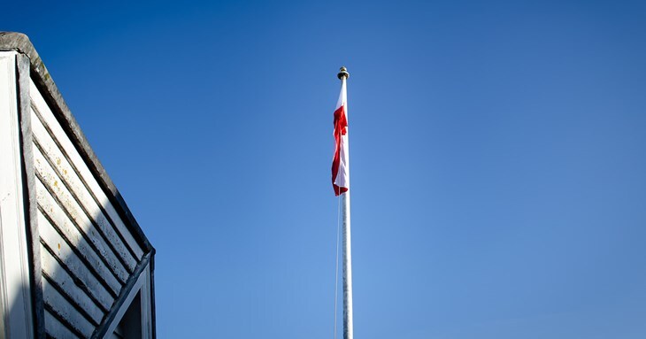 The Polish Flag flying above Exeter's Historic Guildhall