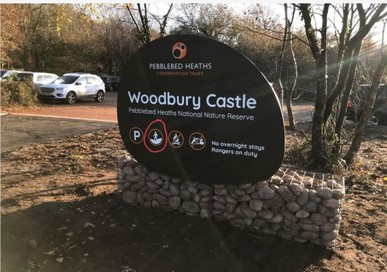 Woodbury Castle car park sign