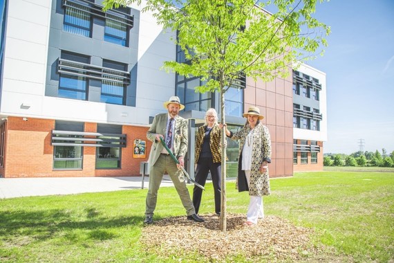 Image of tree being planted by Sir Harry and Lady Studholme and Dr Sally Basker CEO of the Exeter Science Park