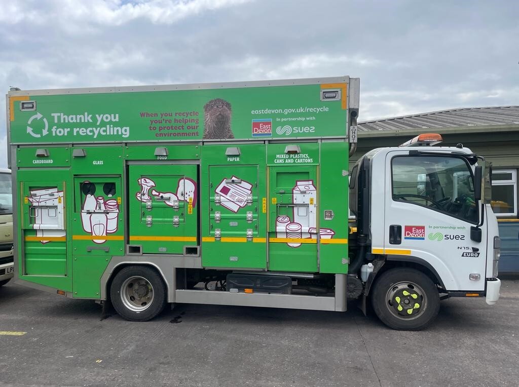 Side view photo of the new recycling truck