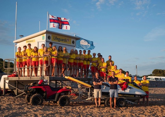 East Devon RNLI lifeguards group photo at Exmouth beach