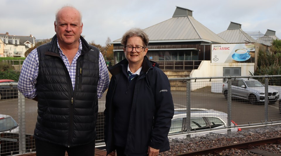 East Devon District Council's Leader, Councillor Paul Arnott and Jenny Nunn, CEO of Seaton Tramway outside Seaton Jurassic