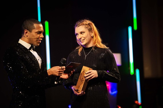 Kara Williams receiving her swimming teacher of the year award 