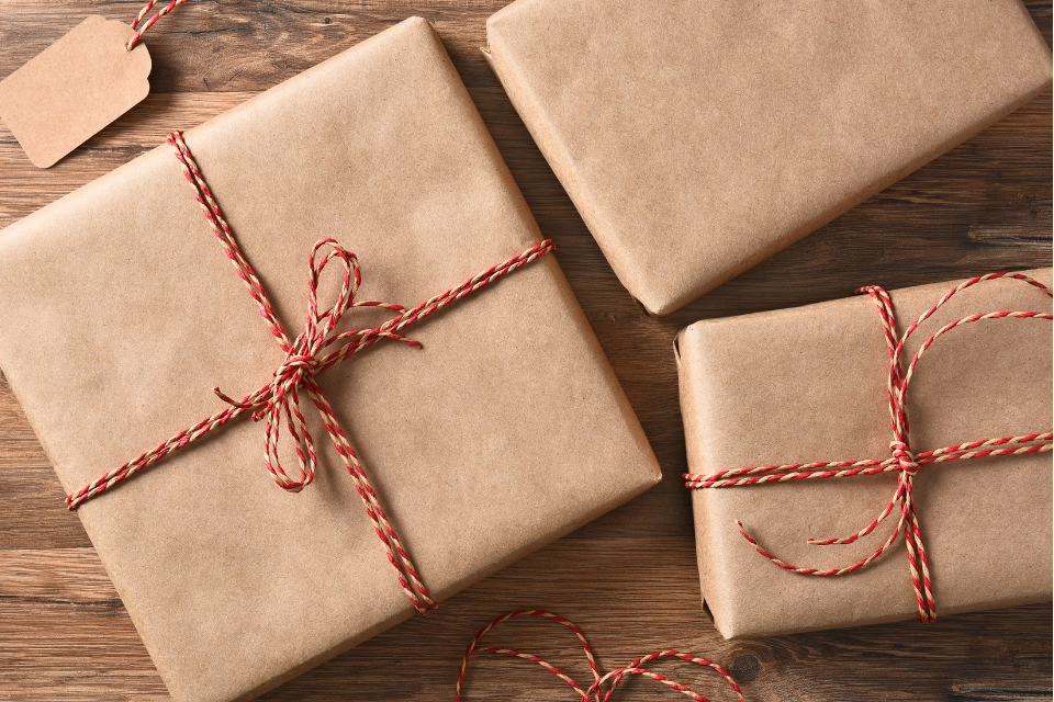 Presents wrapped with plain paper and string