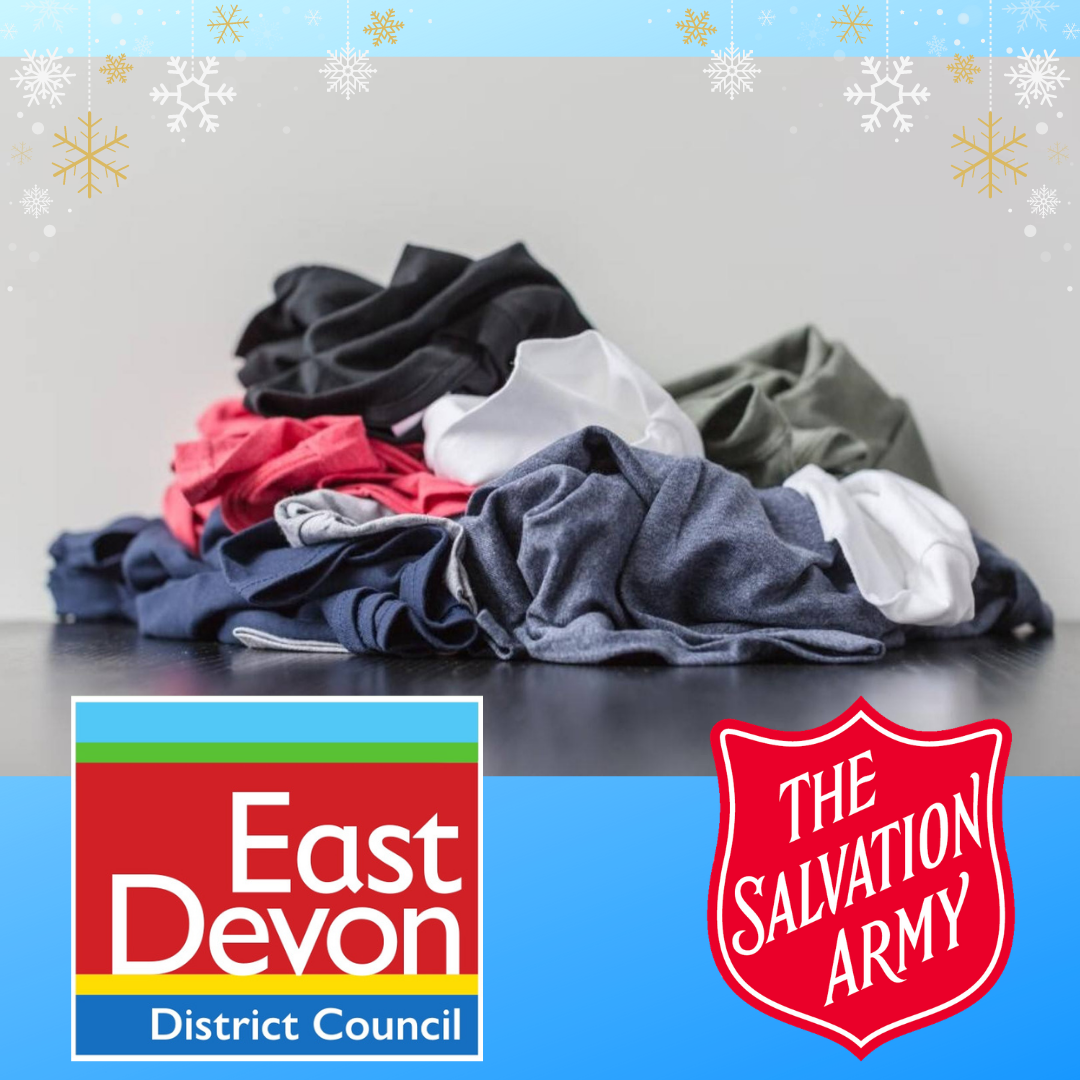 Photo of a pile of textiles, with snowflake illustrations. EDDC and Salvation Army logos