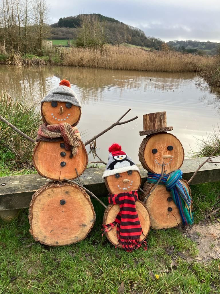 Wooden Snow Men at Seaton Wetlands