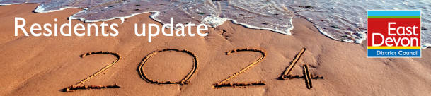 Residents Update Banner - 2024 written in the sand on a beach