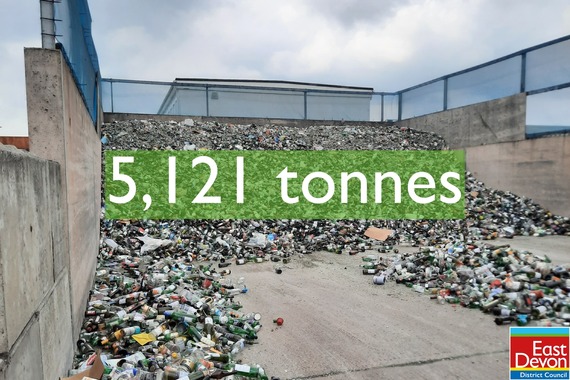 Photo of a pile of glass containers with the text: 5,121 tonnes