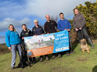 Photo of site managers, wardens and Devon Loves Dogs for breeding birds campaign.