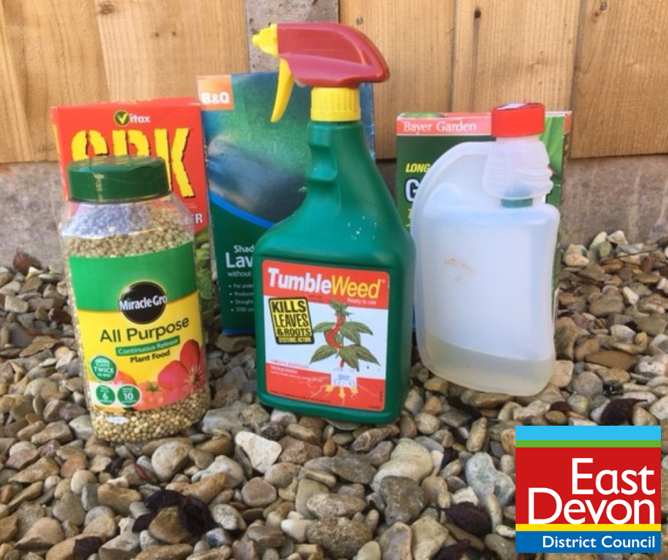 Photo of plastic bottles of garden products such as weed killer and plant food