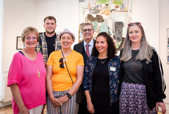 Group photo of THG Open winners, judges, THG curator, and East Devon District Council's Culture portfolio holder
