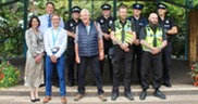 Group photo with Councillor Geoff Jung, Matt Blythe, Assistant Director for Environmental Health, alongside police representatives