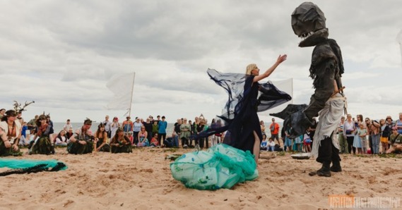 Four of Swords eco-themed performance on Exmouth beach. Credit Appleton Event Photography