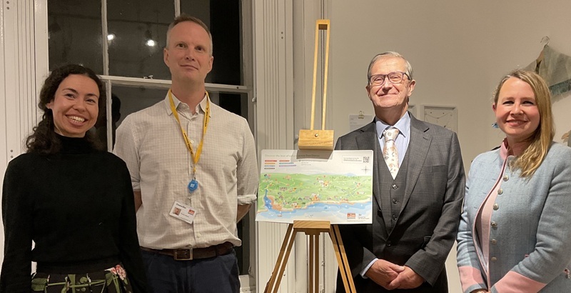 Staff and councillors with new cultural map