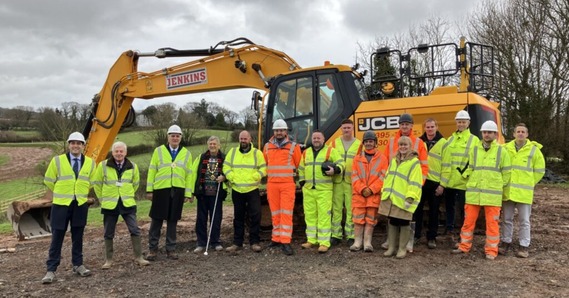 Devon County Council Chairman, councillors, local MP, project partners and contractors at a turf cutting ceremony