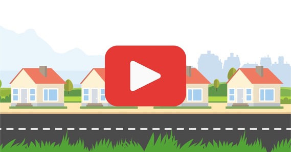 Play button on top of an illustrated row of houses along a road