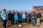 Litter pickers outside Exmouth's Sideshore