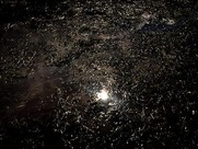 The reflection of moonlight in a puddle by Ashish Ghadiali