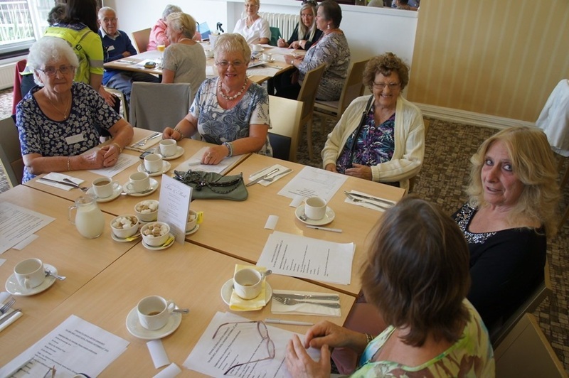 Residents sat around a table having a meeting