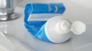 squeezed toothpaste tube