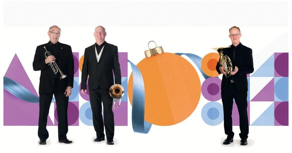 Three people from Bournemouth Symphony Orchestra holding instruments. Baubles and ribbon in the background 