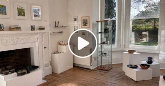 Play button on Thelma Hulbert Gallery exhibition space