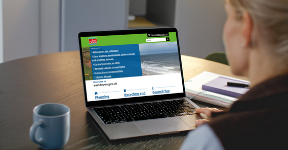 East Devon website on a laptop screen