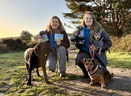 Julie and Trish and their dogs with the DLD dicky bags